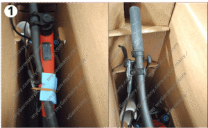 Fahrradlenker und Rahmen in einem gepolsterten Karton gesichert